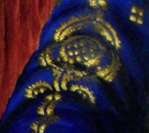 Close-up of the blue and gold brocade on the top of her right sleeve. On the left hand side, you can see the grain of the wood in the background (the wood that I have painted - the support surface for the actual painting, the Italian poplar is buried under layers of gesso and oil paint). Copyright (c)2016 Paul Alan Grosse