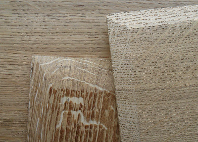 Quarter cut oak cut to make panels for painting, showing the bevelled edges of several panels. Copyright (c)2017 Paul Alan Grosse