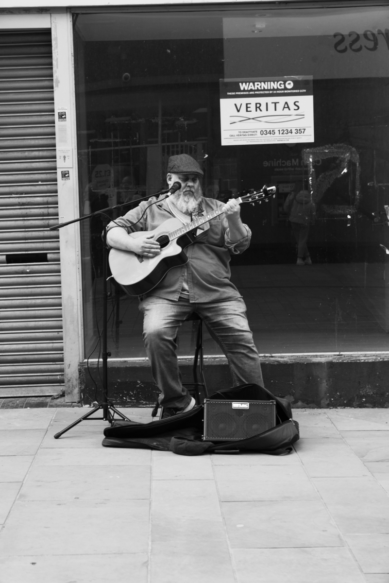 Derby: City Centre Busker 20230417 Copyright (c)2023 Paul Alan Grosse. All Rights Reserved.
