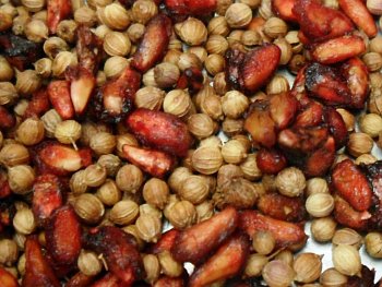 Anardana (pomegranate seeds) and coriander seeds.