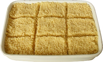 Carefully spread out the crumble mixture, a little at a time, to make sure it is even.