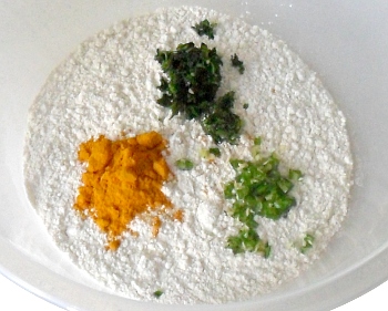 Flour, salt, turmeric, coriander and chilli.  