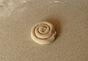 Roll the roll to make a spiralled spiral.  