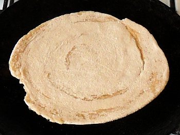 Fry on a hot, oiled tava in sunflower oil.  