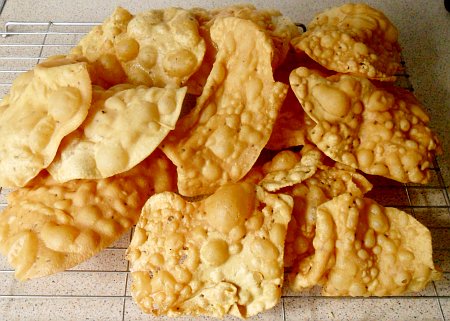 A pile of papads, ready to eat.