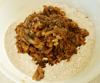 Place the cooled filling ingredients onto the flour.