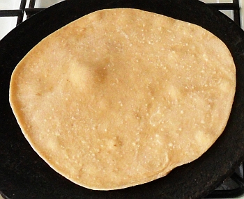 Cook on this side until it bubbles like so...  