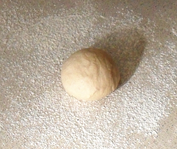 Start off with a 6cm diameter ball of soft dough.