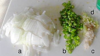 a) chopped onion; b) chopped chillies; c) grated galangal; and, d) chopped lemongrass.